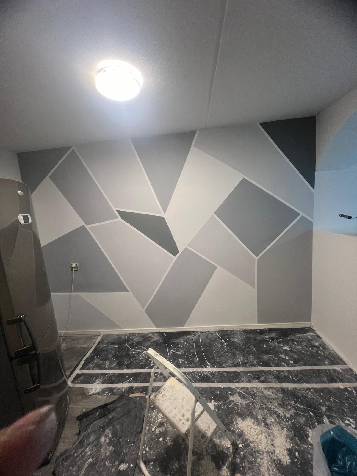 Geometrisch behang in slaapkamer